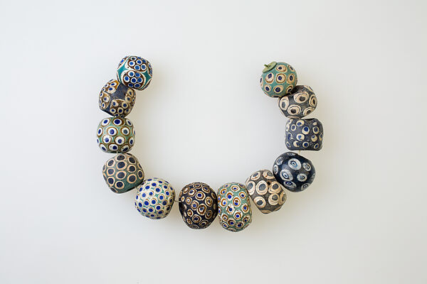 String of 12 Eye Beads