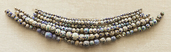 String of 50 Eyed Beads