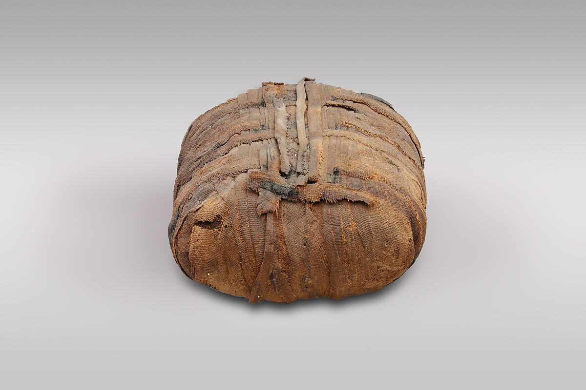 Sacred animal mummy bundle containing shrews, Dyed linen, animal remains, mummification materials