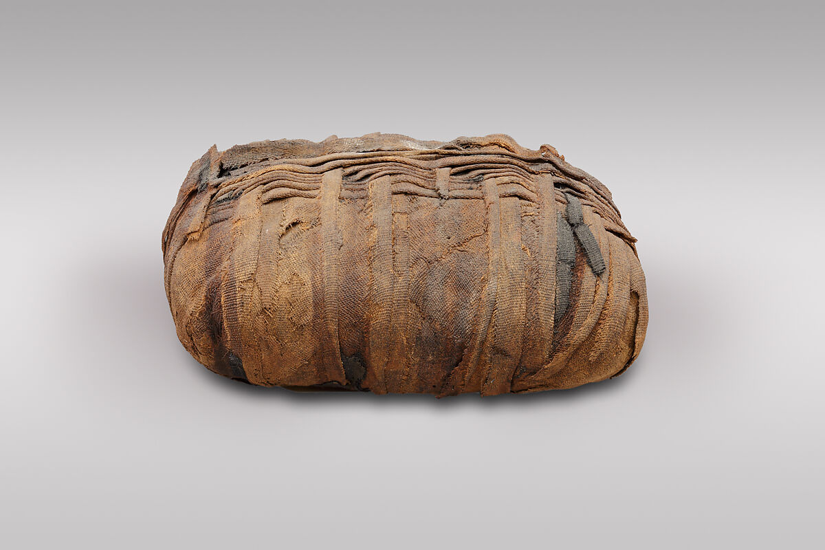 Sacred animal mummy bundle containing shrews, Dyed linen, animal remains, mummification materials