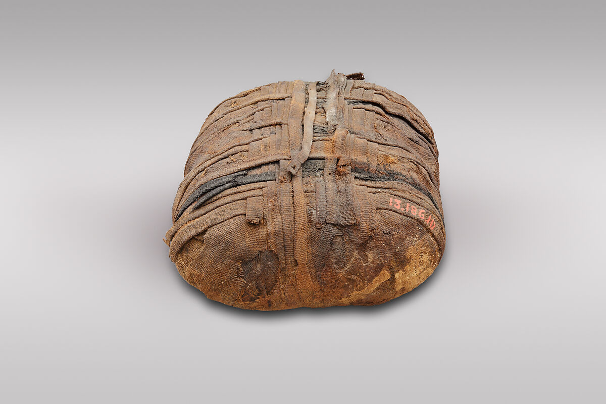 Sacred animal mummy bundle containing shrews, Dyed linen, animal remains, mummification materials