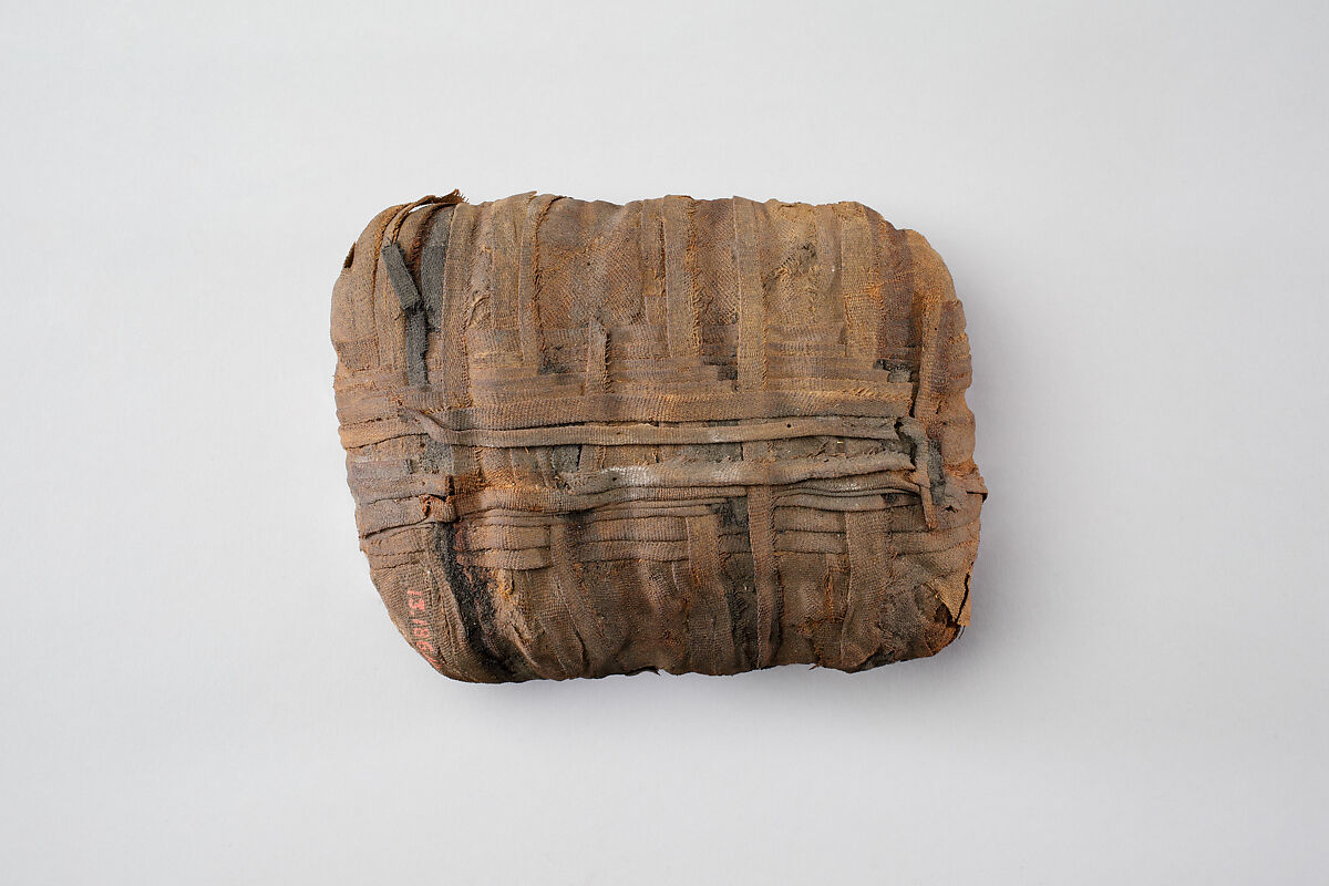 Sacred animal mummy bundle containing shrews, Dyed linen, animal remains, mummification materials