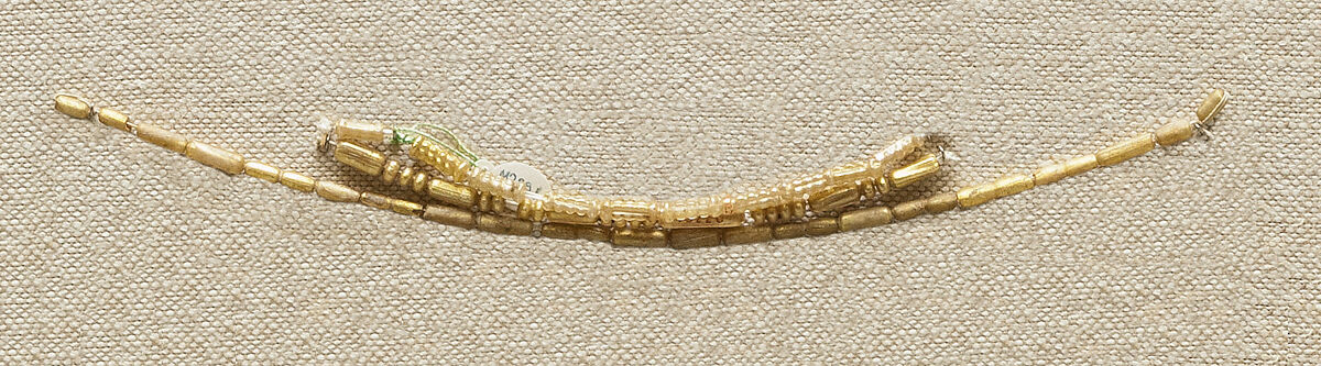 String of 10 Beads, Gilt glass 