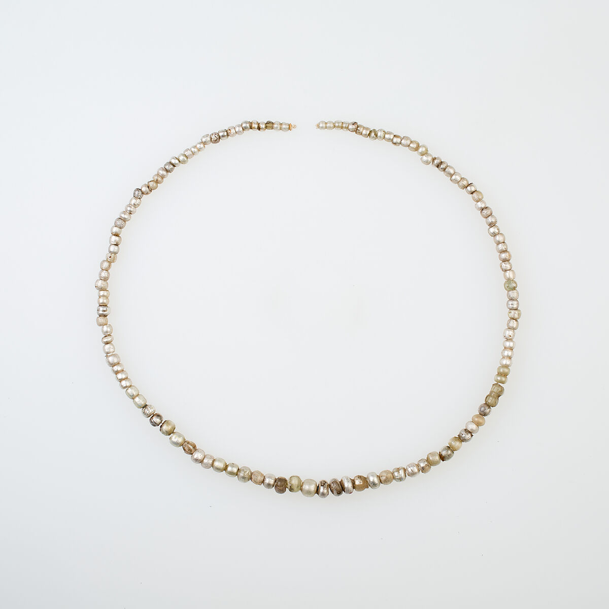 String of Beads, Glass, gold foil 