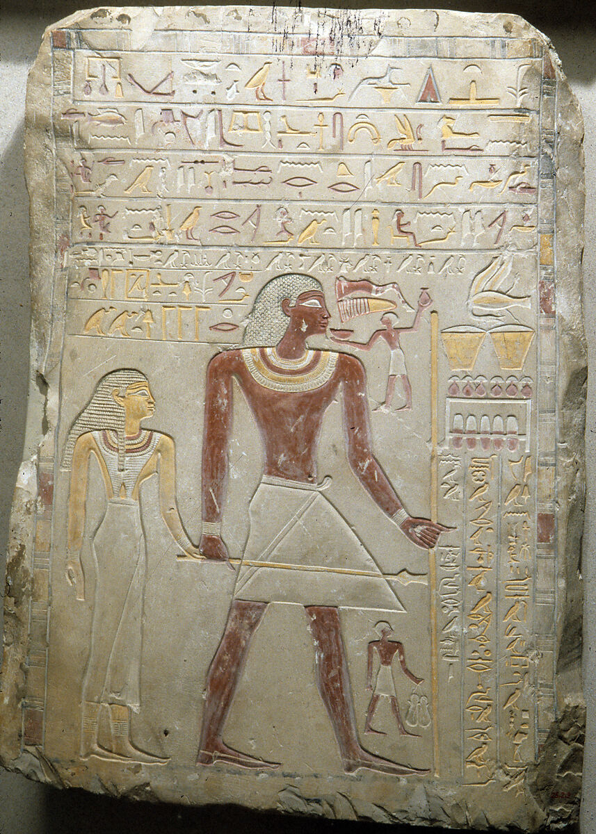 Funerary Stela of the Royal Sealer Indi and His Wife, the Priestess of Hathor Mutmuti of Thinis, Limestone, paint 