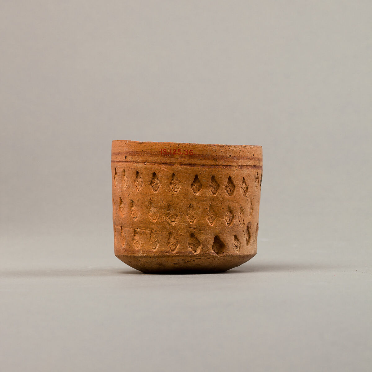 Cup with three rows of impressed decoration, Pottery, paint 