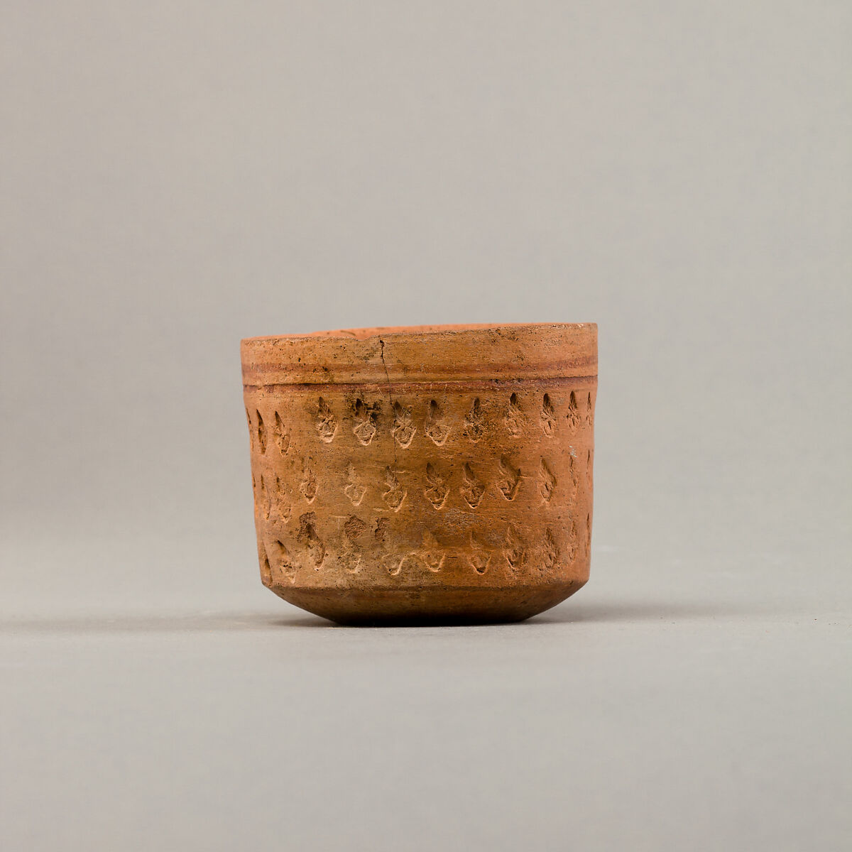 Cup with three rows of impressed decoration, Pottery, paint