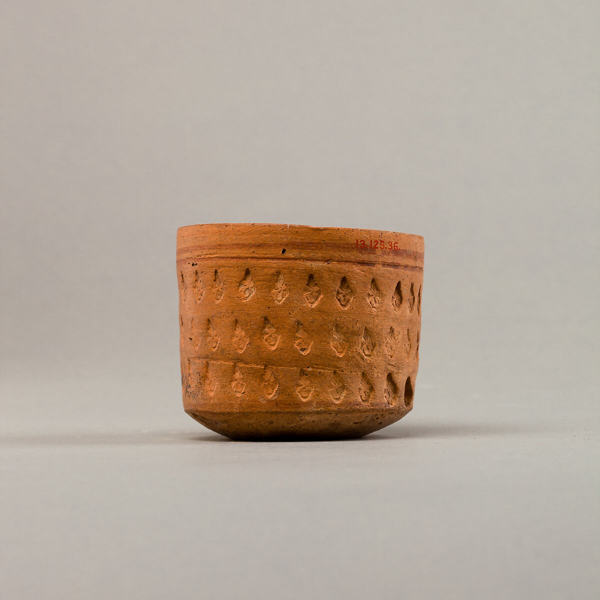 Cup with three rows of impressed decoration, Pottery, paint