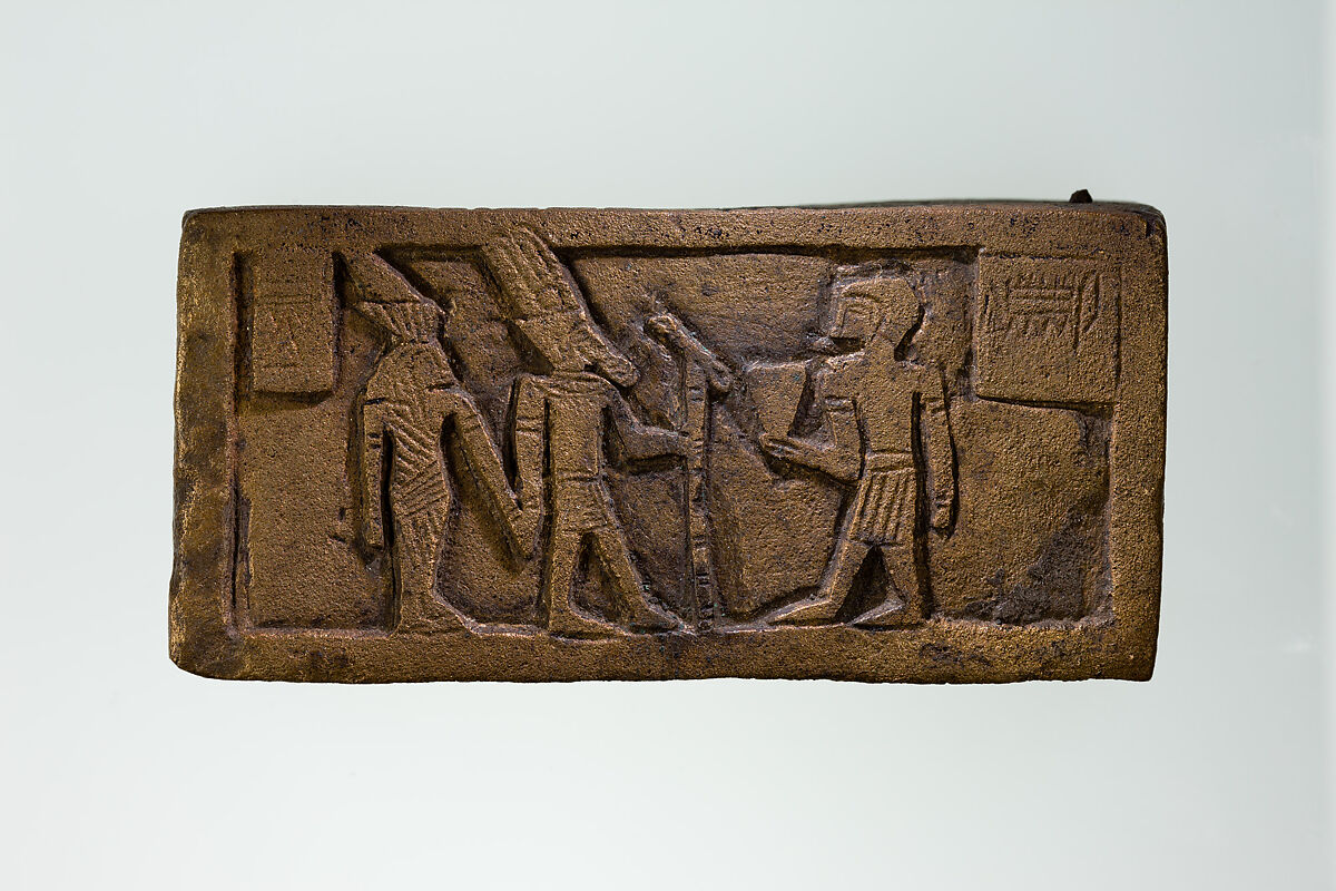 Part of a bronze statue base inscribed in Egyptian and Greek, Copper alloy 