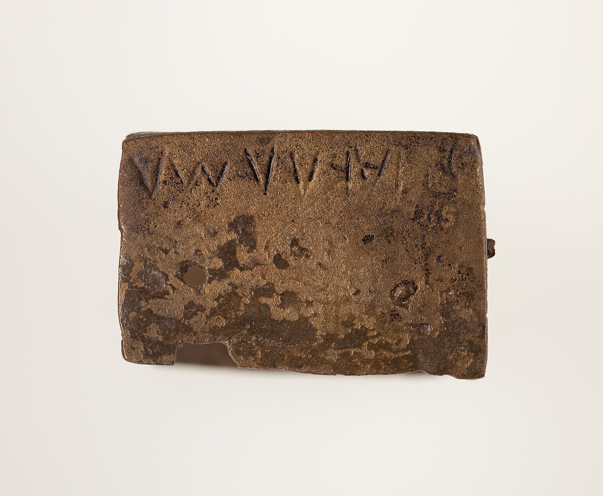 Part of a bronze statue base inscribed in Egyptian and Greek, Copper alloy