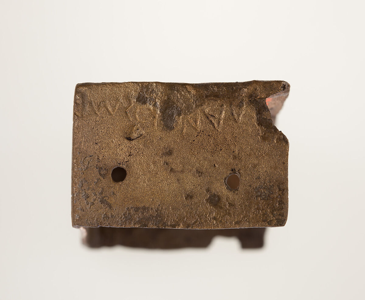 Part of a bronze statue base inscribed in Egyptian and Greek, Copper alloy