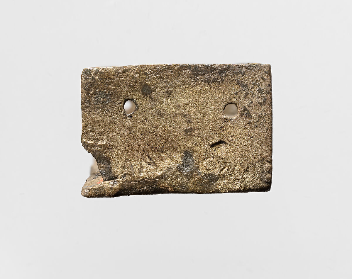 Part of a bronze statue base inscribed in Egyptian and Greek, Copper alloy