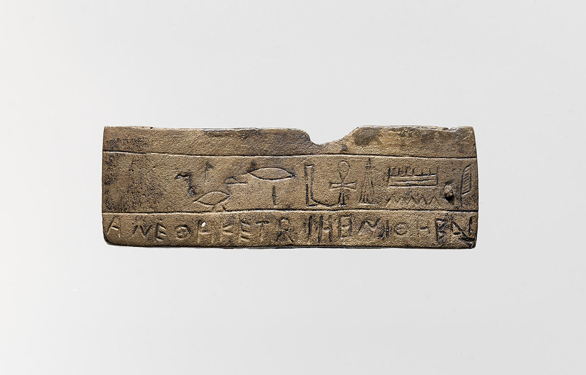 Part of a bronze statue base inscribed in Egyptian and Greek, Copper alloy