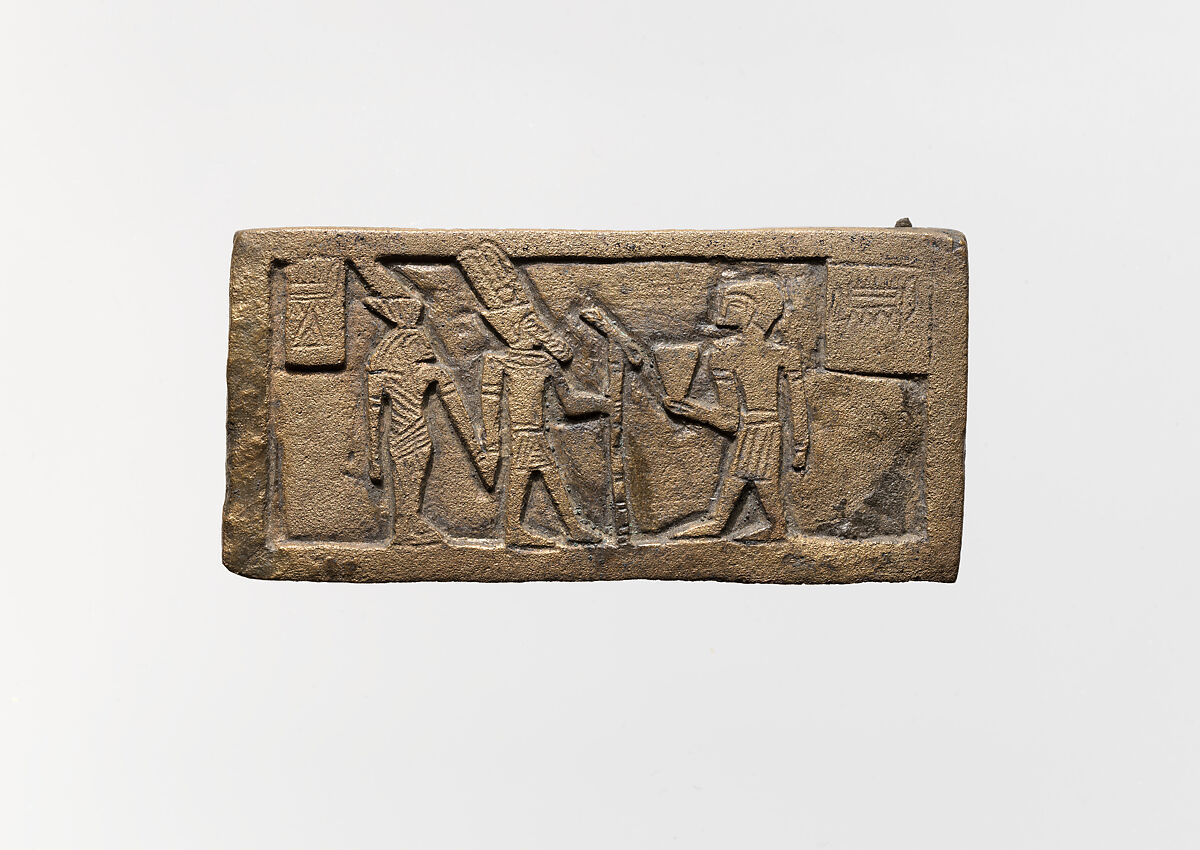 Part of a bronze statue base inscribed in Egyptian and Greek, Copper alloy