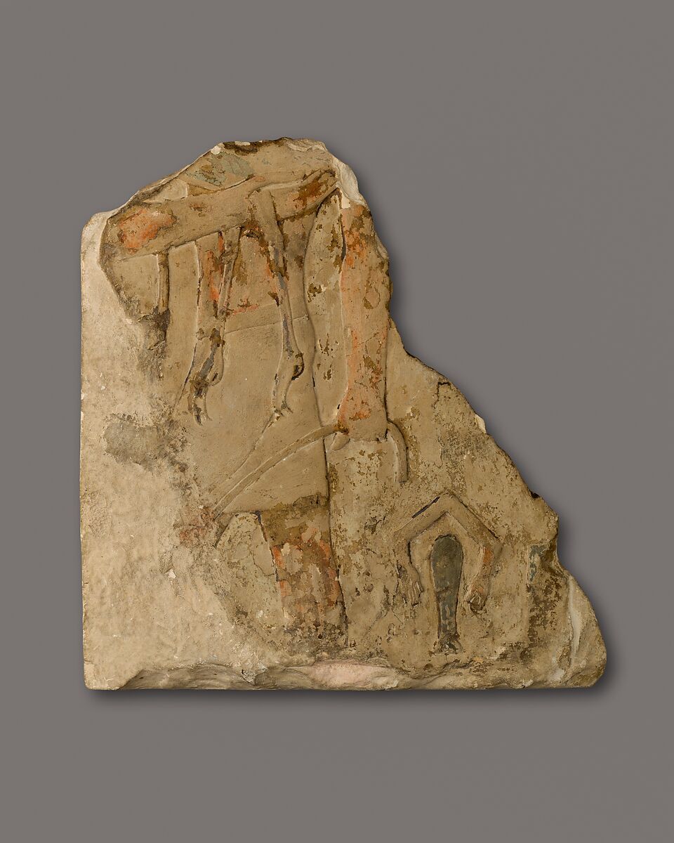 Relief fragment of a man carrying an ostrich, Limestone 