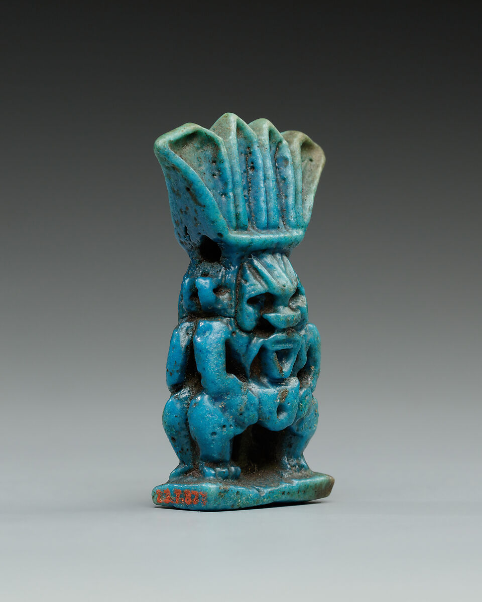 Double-sided Bes amulet, Faience