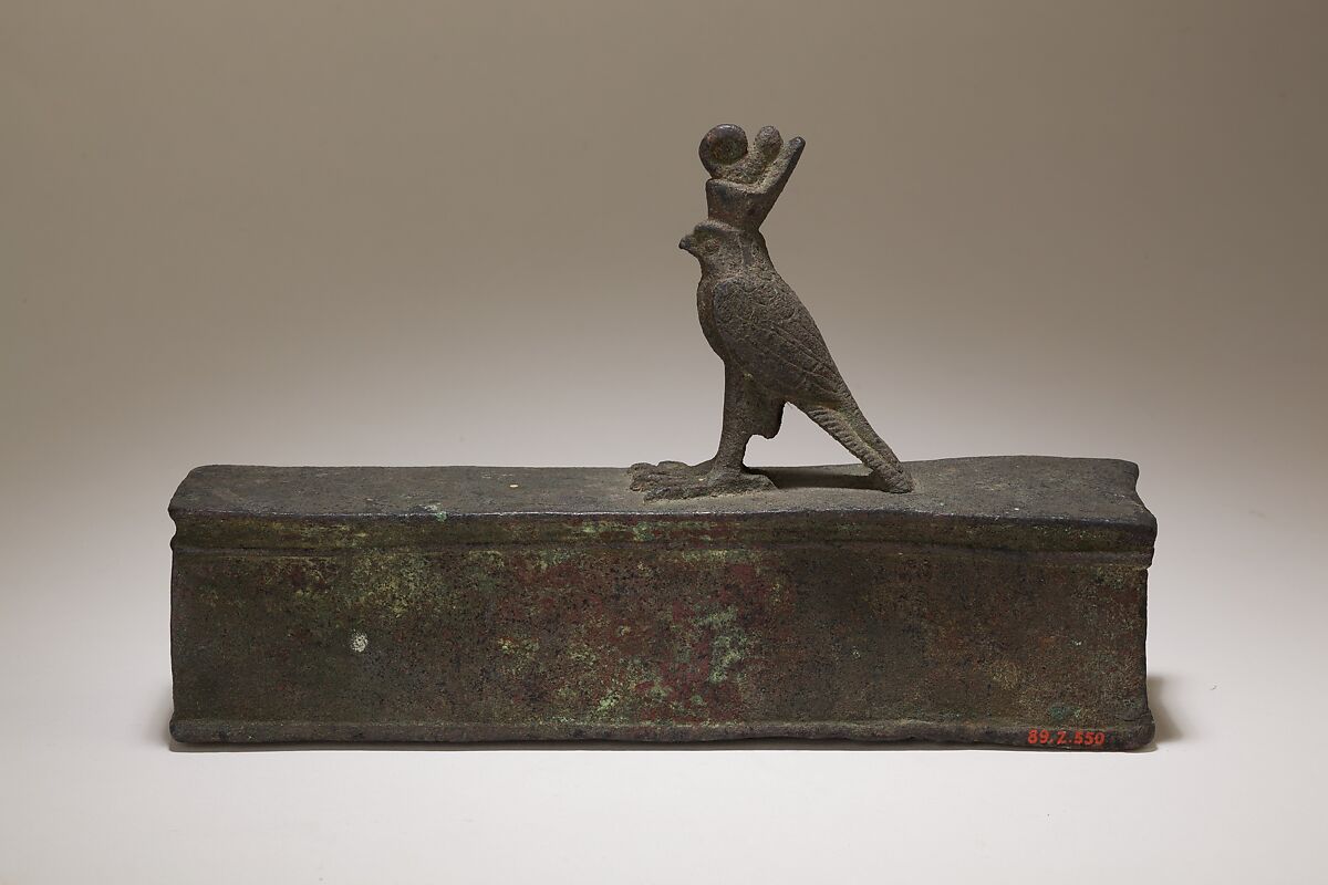 Case for an animal mummy topped by a falcon, Cupreous metal