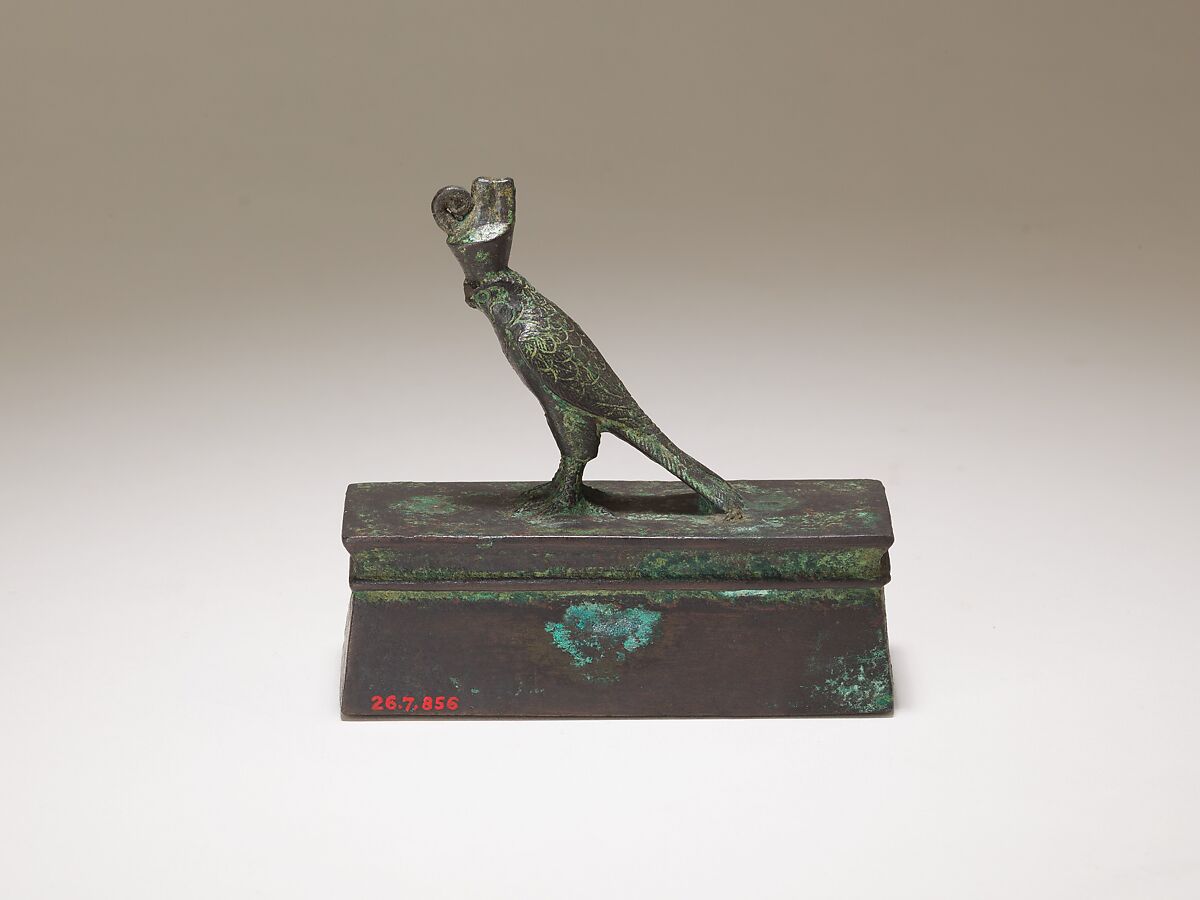 Falcon in double crown surmounting a shrine-shaped box for an animal mummy, Cupreous metal