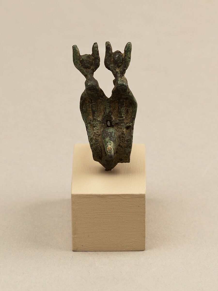 Vulture head and double uraei with disk and horn crowns, from statue of a goddess, Cupreous metal