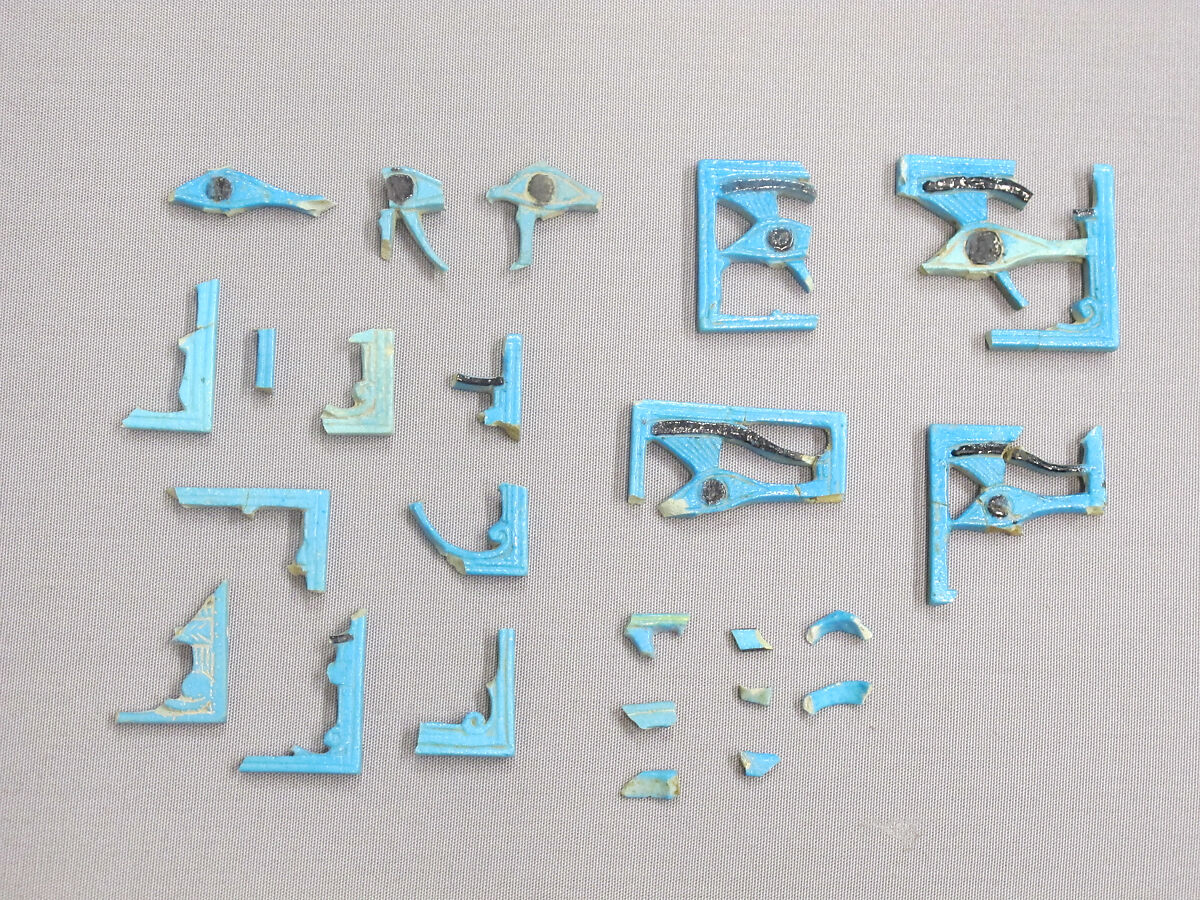 Fragments of wedjat eye amulets, Faience 