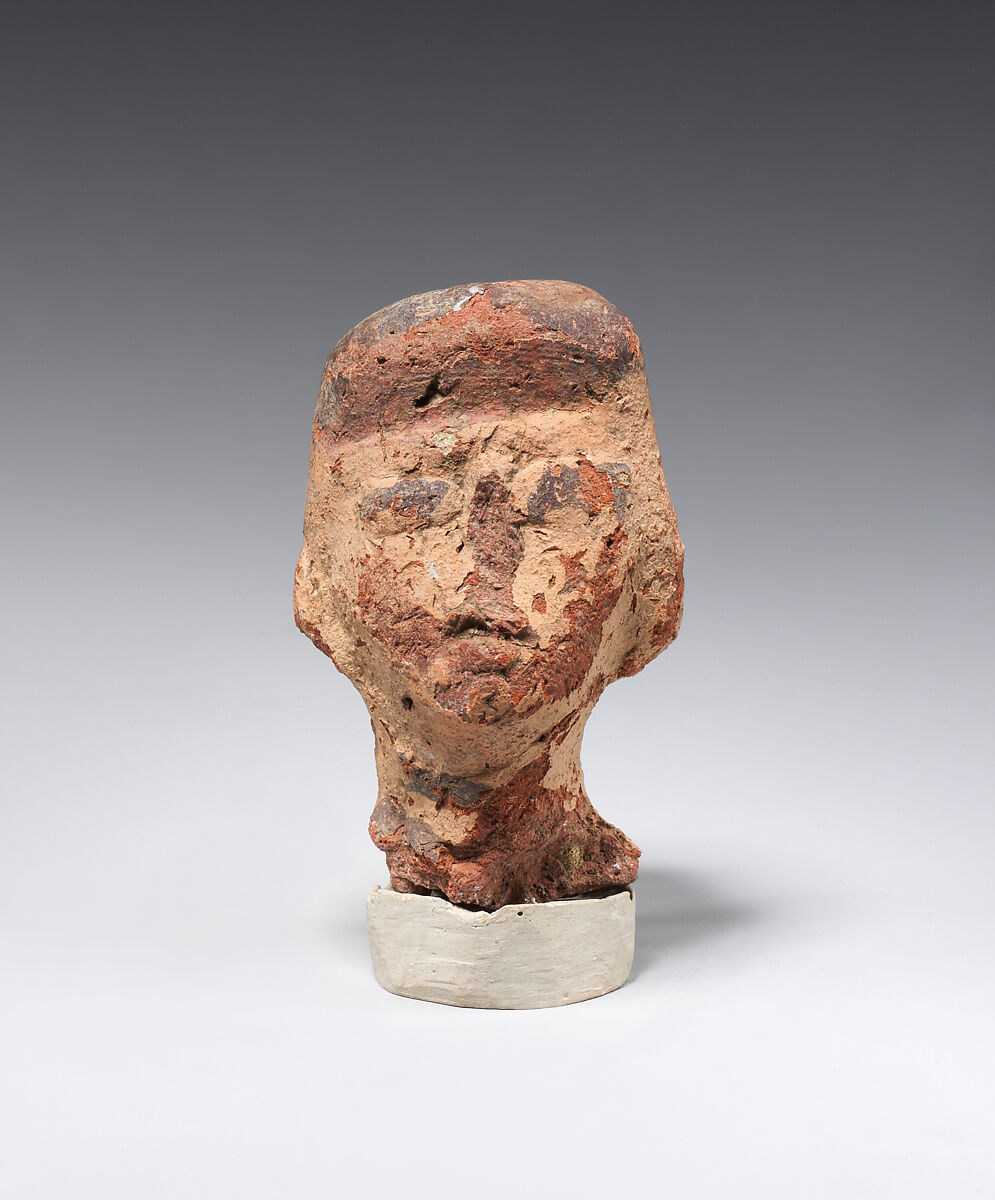 Head from a figurine, Pottery, paint 