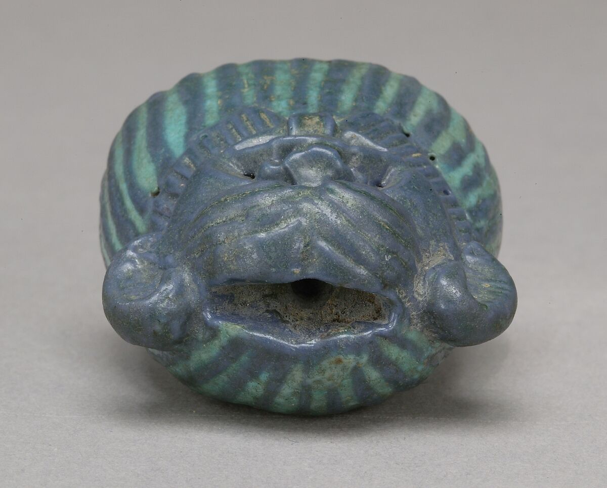 Bes-image as part of a mirror, Faience