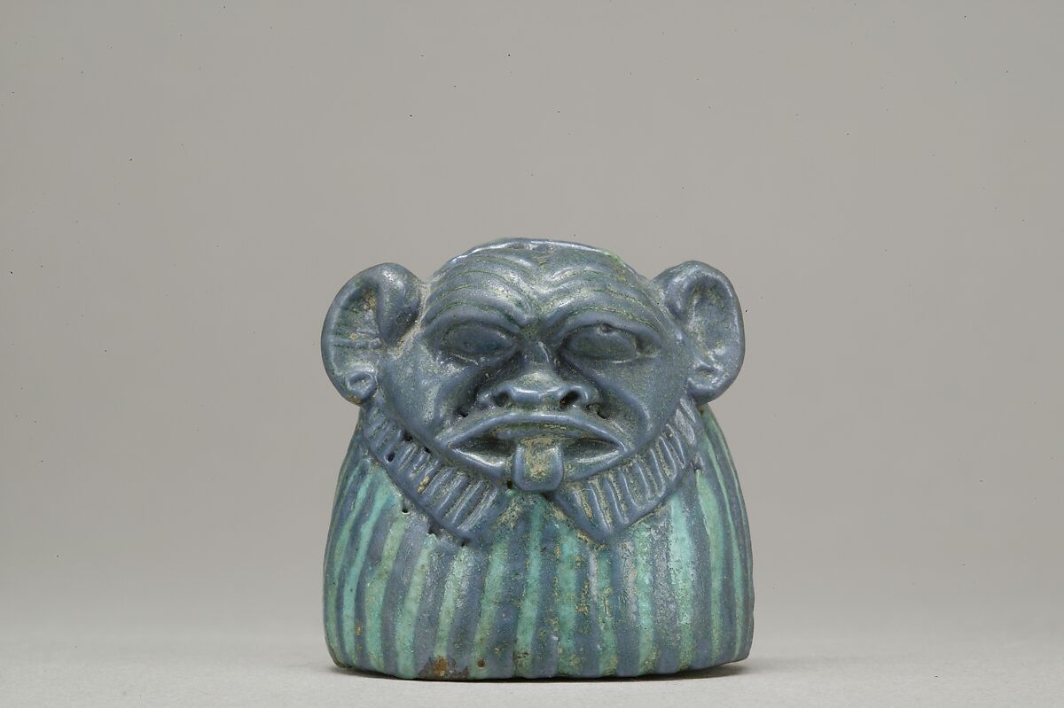 Bes-image as part of a mirror, Faience