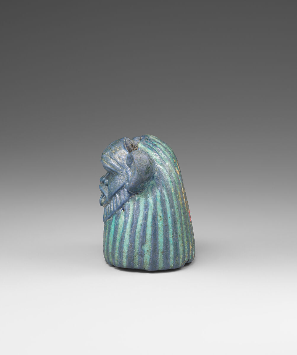 Bes-image as part of a mirror, Faience