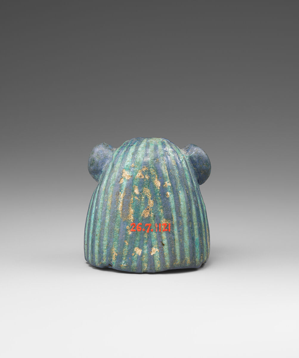 Bes-image as part of a mirror, Faience