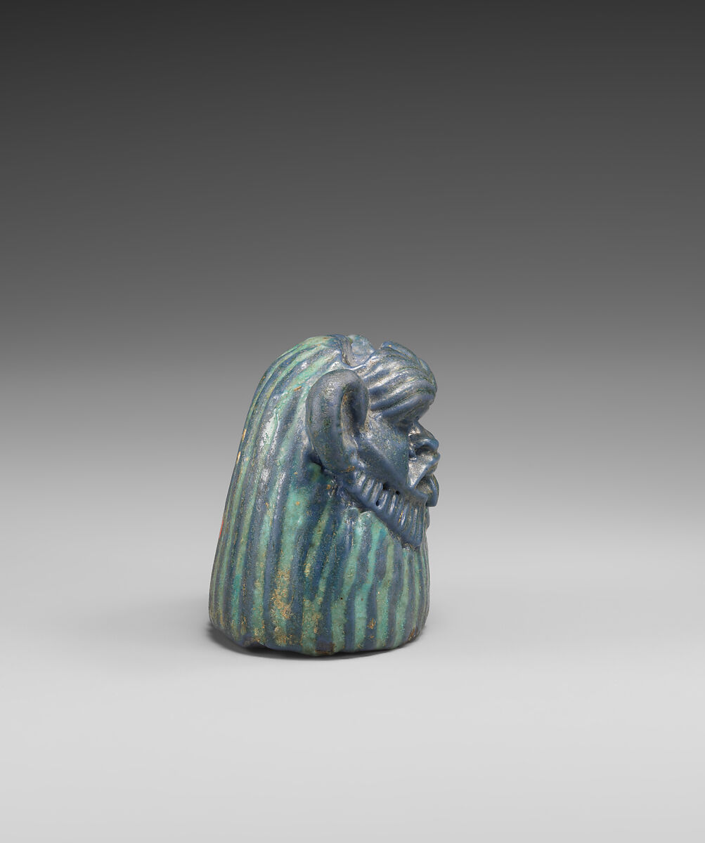 Bes-image as part of a mirror, Faience