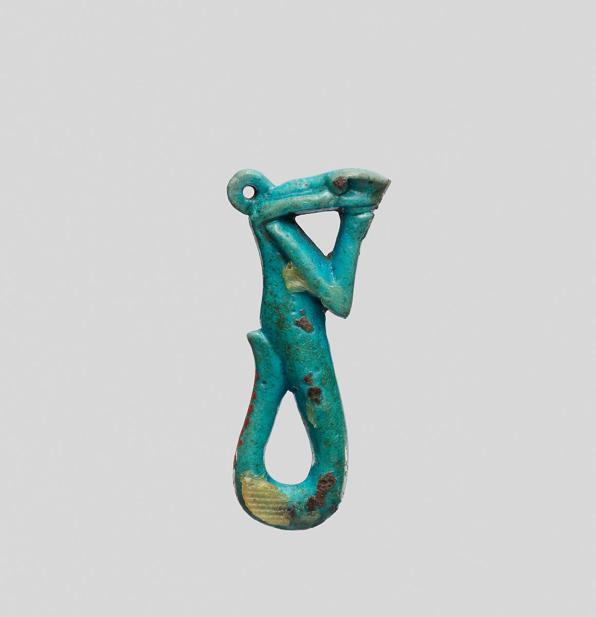 Amulet in the form of a serpent decan with raised arms, Faience