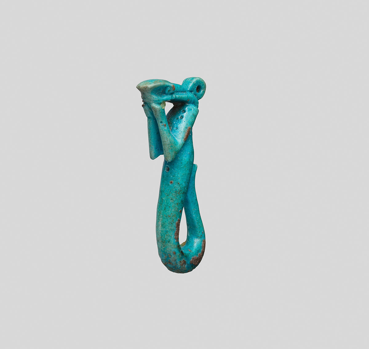 Amulet in the form of a serpent decan with raised arms, Faience