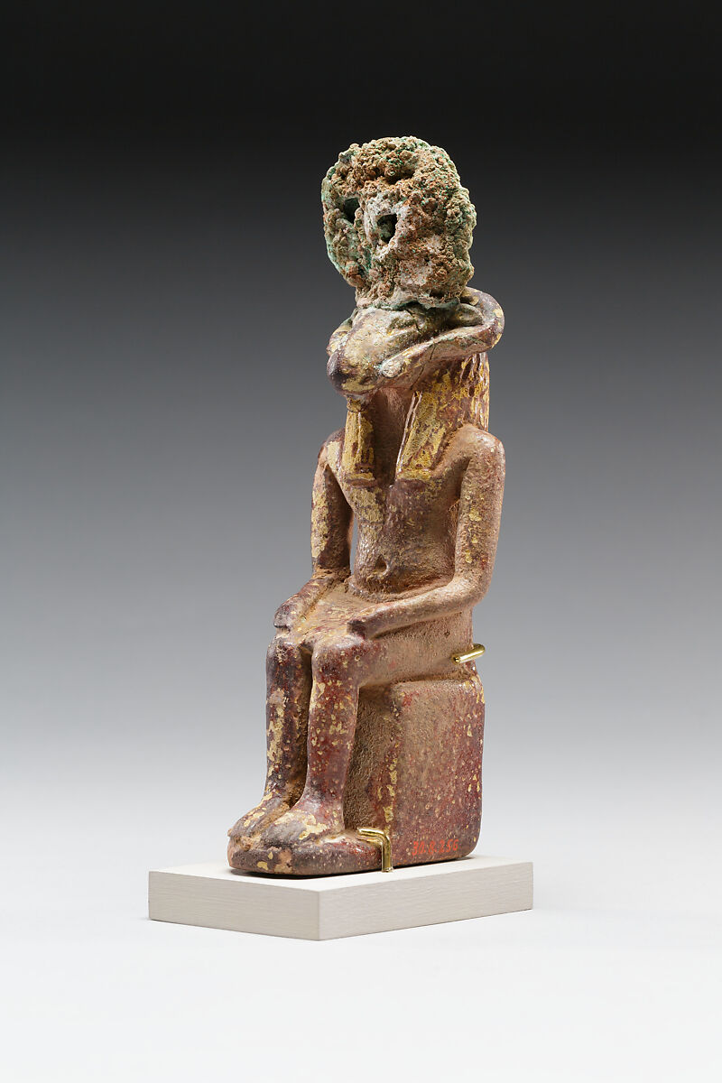 Seated ram-headed god, possibly Amun-Re, Faience, cupreous metal (headdress)
