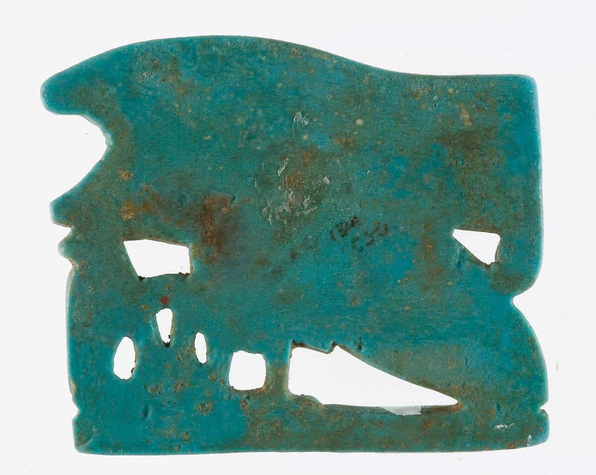 <em>Wedjat</em> eye amulet with a wing and other elements, Faience