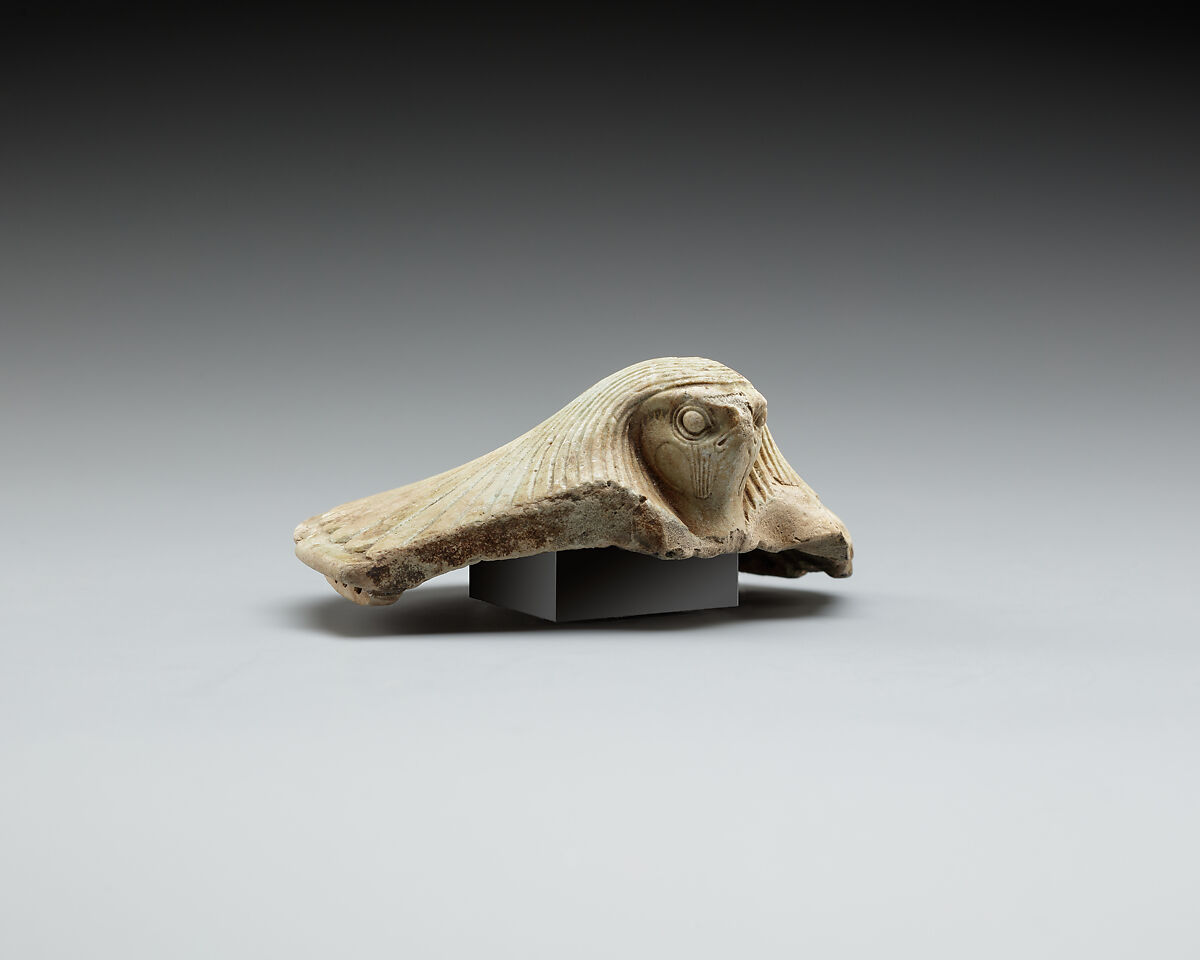 Lid fragment in form of a falcon's head, Faience 