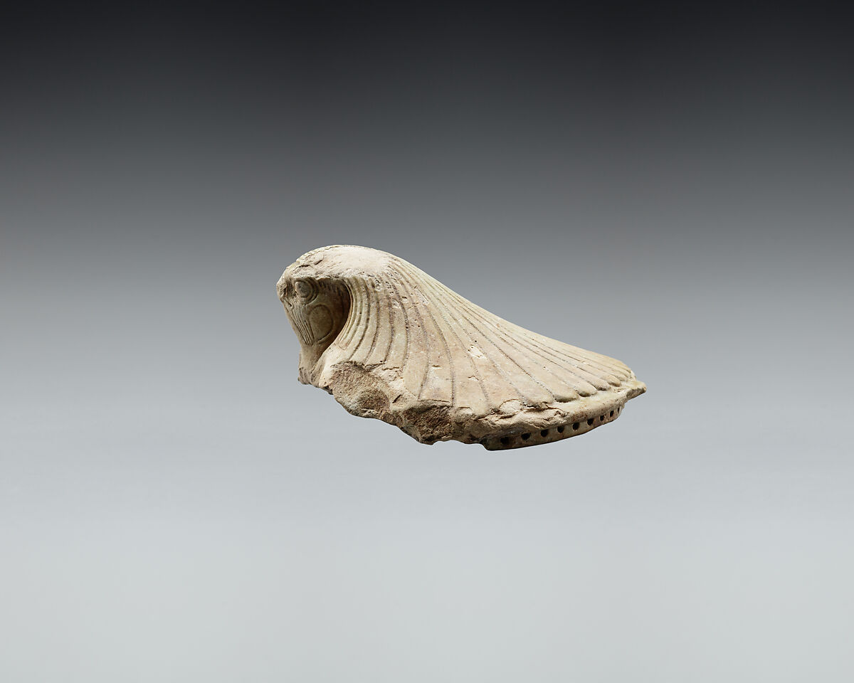 Lid fragment in form of a falcon's head, Faience