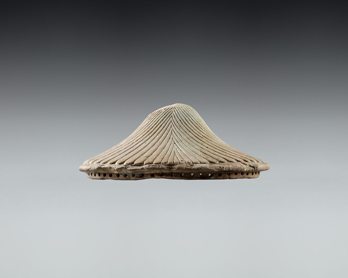 Lid fragment in form of a falcon's head, Faience