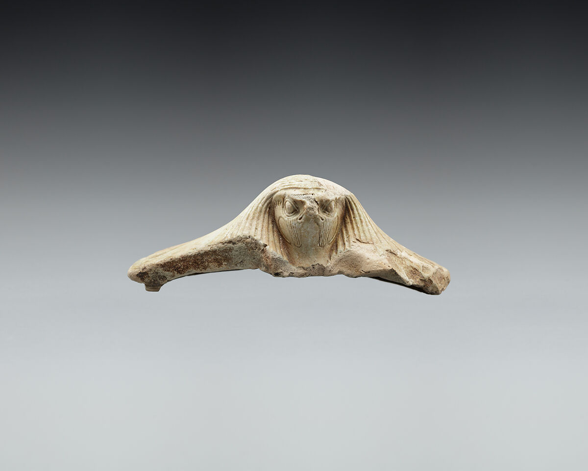 Lid fragment in form of a falcon's head, Faience