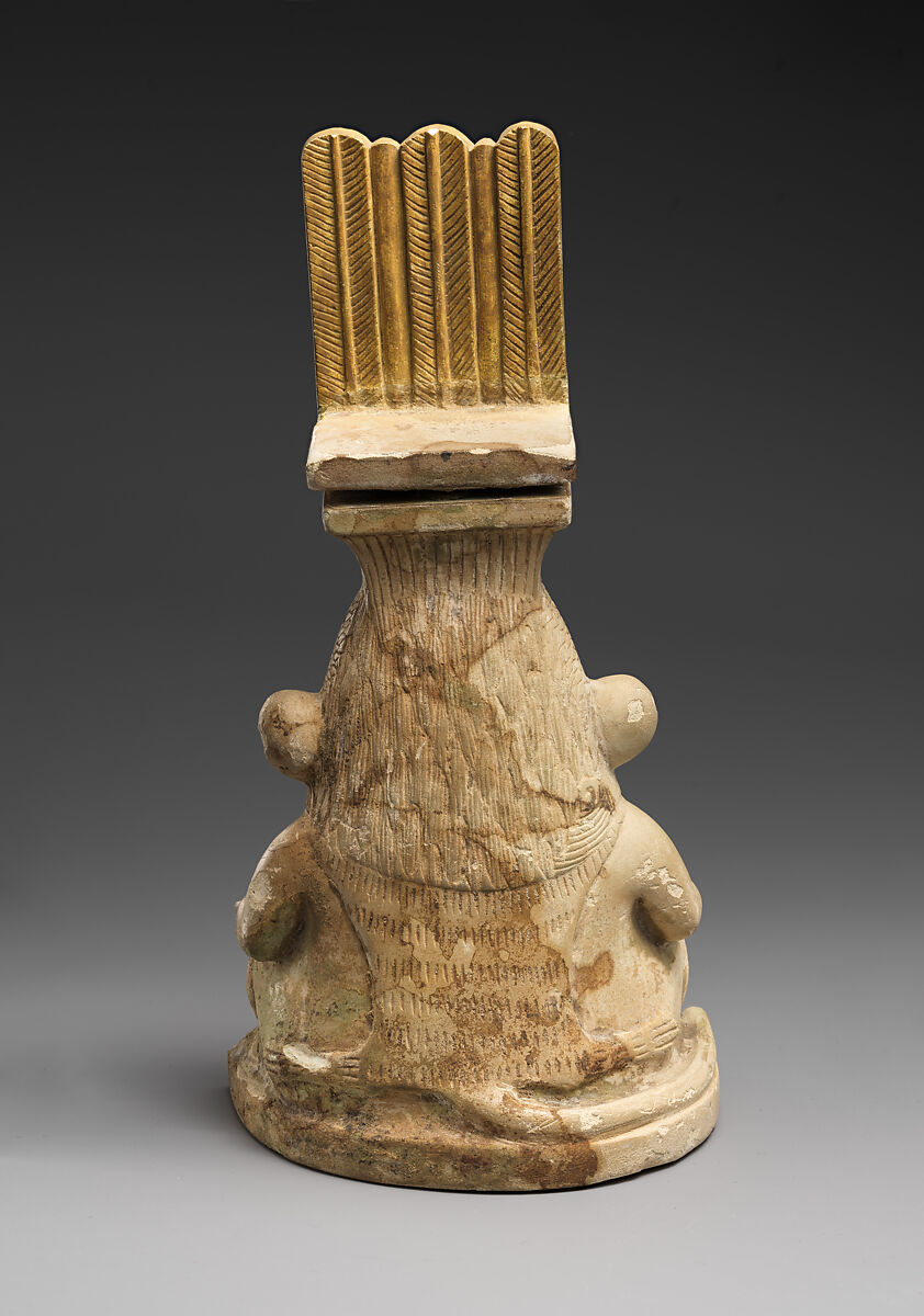 Lidded container in the shape of a Bes-image, Faience