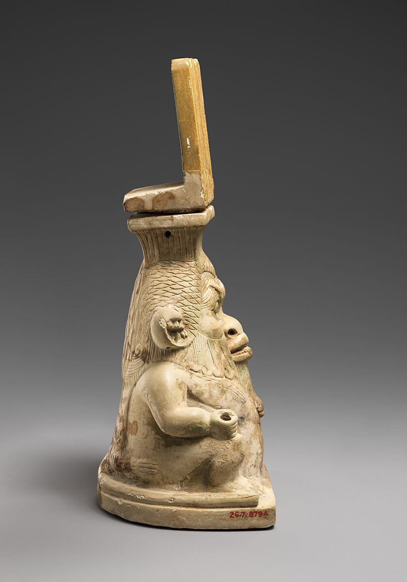 Lidded container in the shape of a Bes-image, Faience