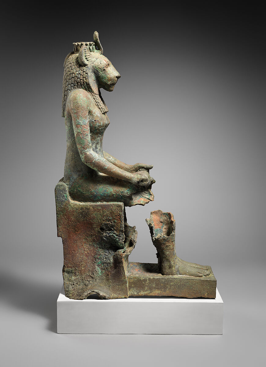 Statue of lion-headed Wadjet inscribed for Minirdis, son of Panehsy and of Aarwt(?) whose parents are Horwedja and Nitocris, Leaded bronze