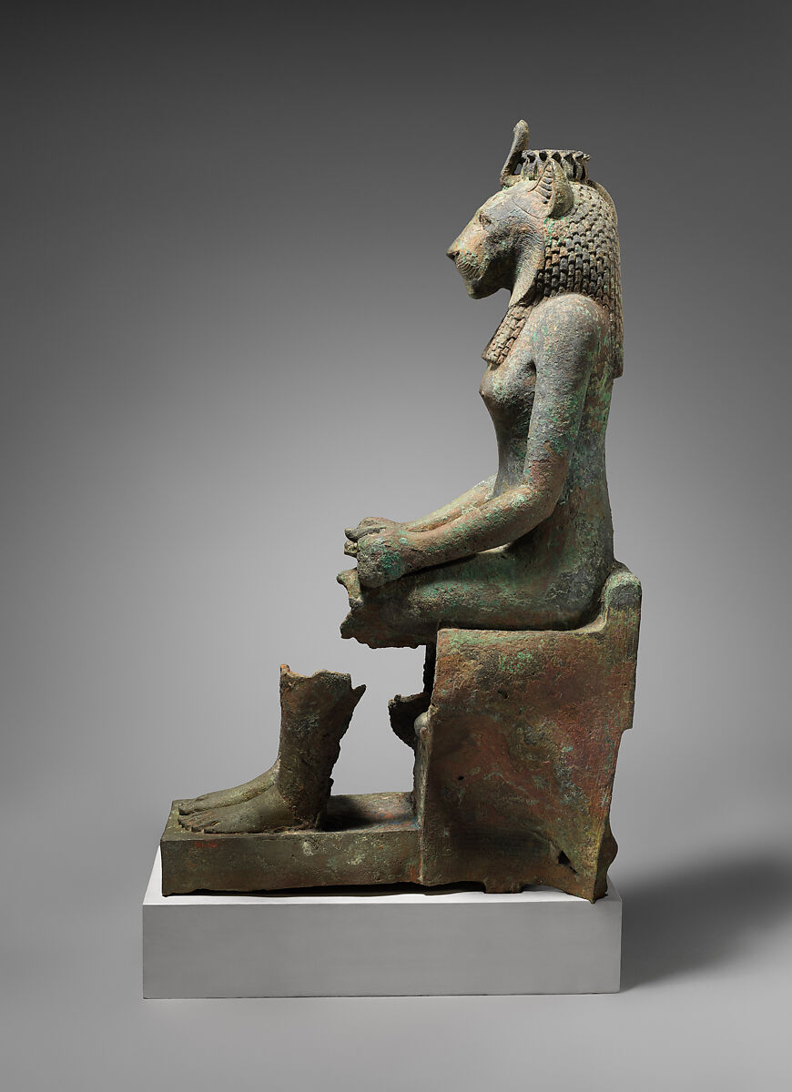 Statue of lion-headed Wadjet inscribed for Minirdis, son of Panehsy and of Aarwt(?) whose parents are Horwedja and Nitocris, Leaded bronze