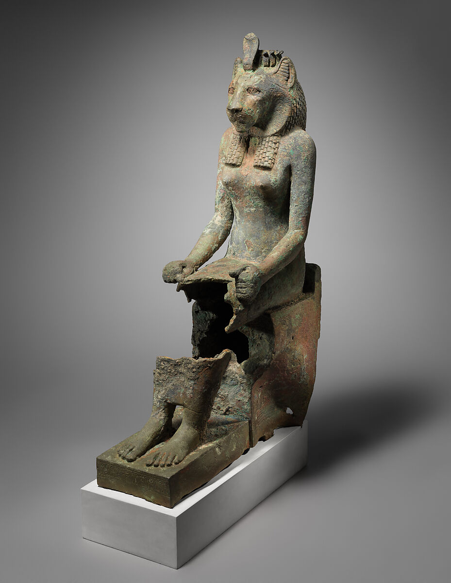 Statue of lion-headed Wadjet inscribed for Minirdis, son of Panehsy and of Aarwt(?) whose parents are Horwedja and Nitocris, Leaded bronze