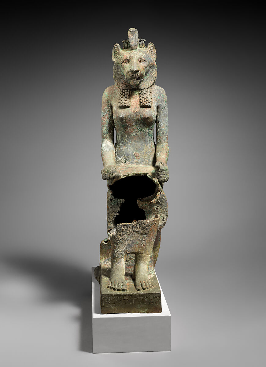 Statue of Wadjet inscribed for Minirdis, son of Panehsy and of Aarwt(?) whose parents are Horwedja and Nitocris, Leaded bronze 