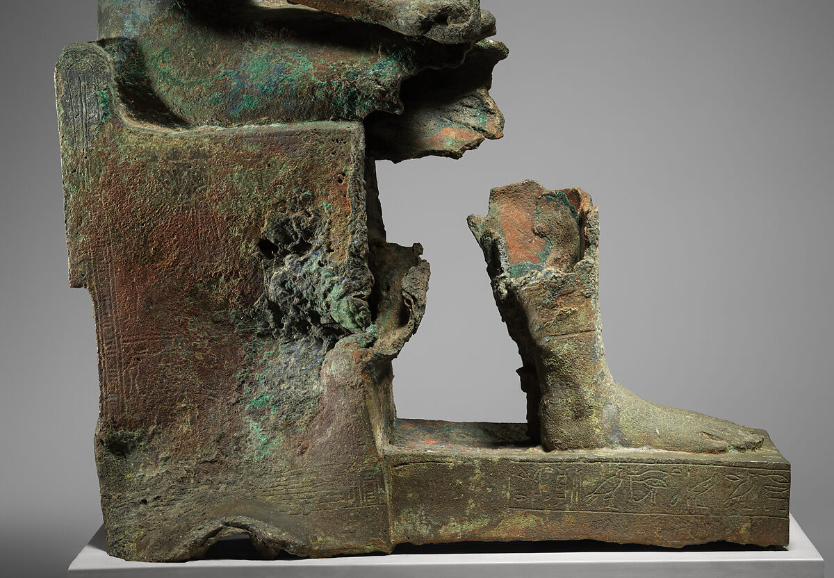 Statue of lion-headed Wadjet inscribed for Minirdis, son of Panehsy and of Aarwt(?) whose parents are Horwedja and Nitocris, Leaded bronze