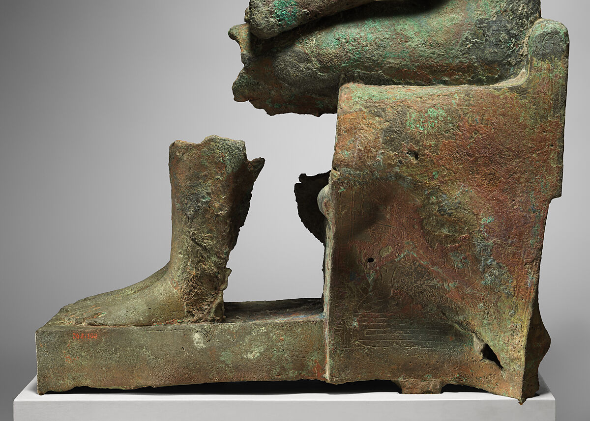 Statue of lion-headed Wadjet inscribed for Minirdis, son of Panehsy and of Aarwt(?) whose parents are Horwedja and Nitocris, Leaded bronze