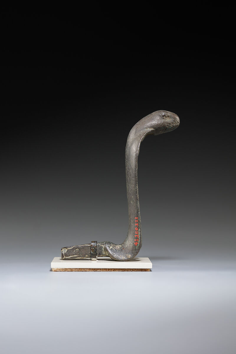 Uraeus decoration from shrine, Bronze