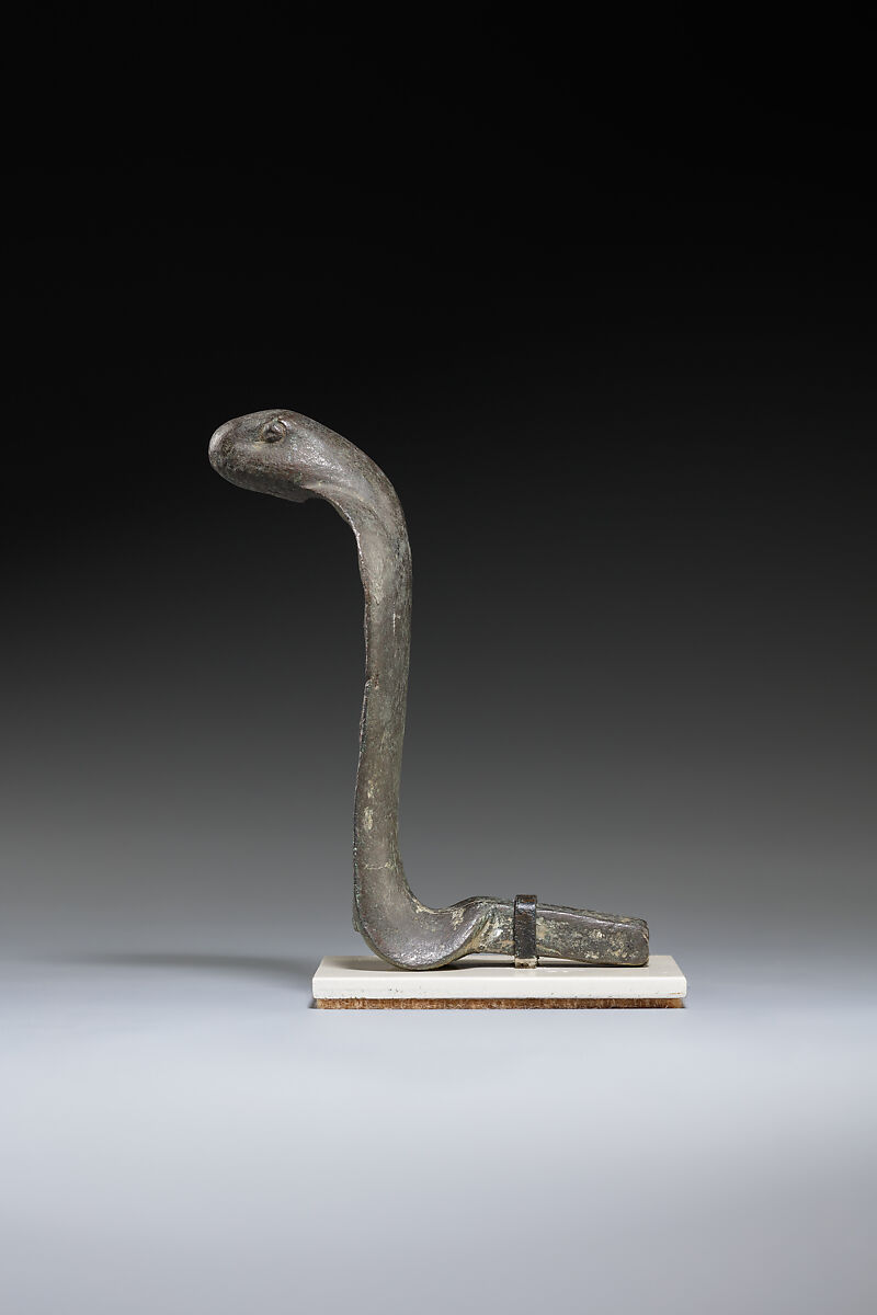 Uraeus decoration from shrine, Bronze