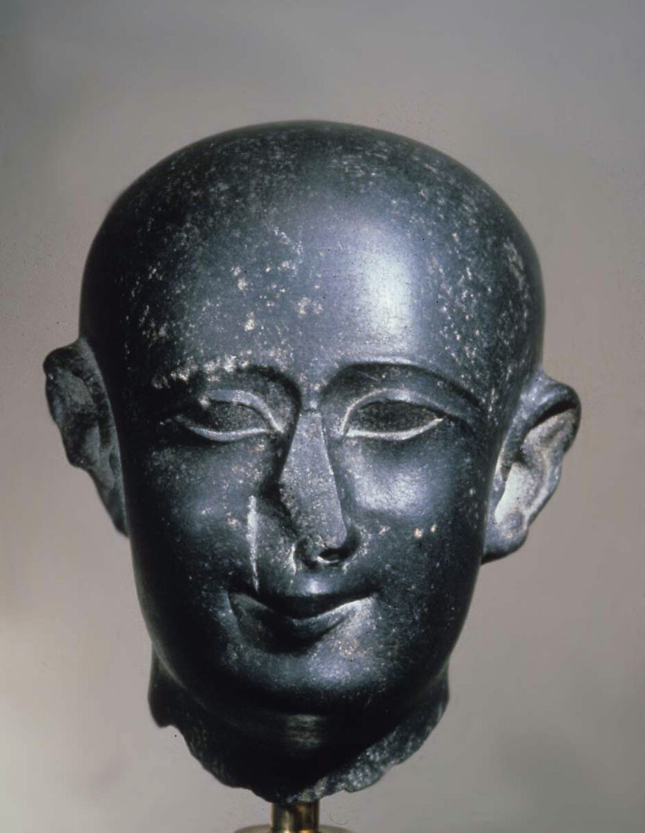 Head, male priest, Greywacke or diorite 