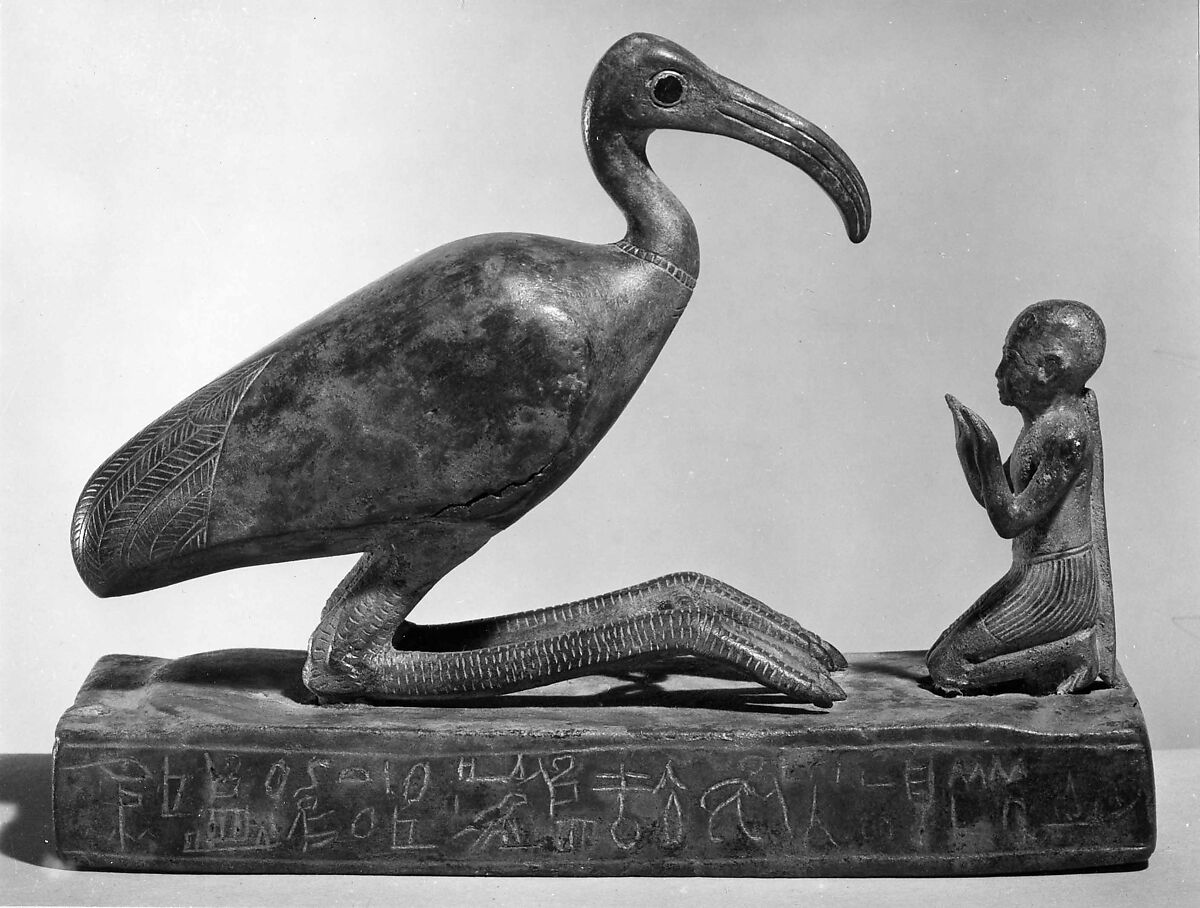 Group statue of Thoth-ibis and devotee on a base inscribed for Padihorsiese, Cupreous metal